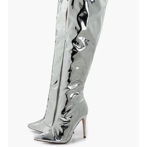 Metallic silver thigh high boots